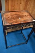 An oriental hardwood occasional table, bamboo effect design, approx 50 x 36cm, height 71cm