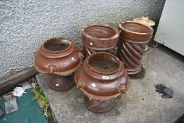 A selection of vintage saltglazed urns/planter