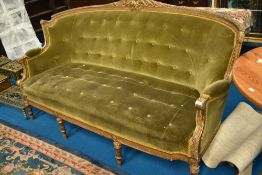 A French style settee having later dralon upholstery