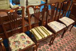 A set of Four Edwardian mahogany dining chairs.