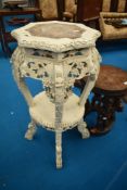 A painted jardiniere stand with marble inset top