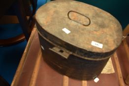 A vintage tin hat box