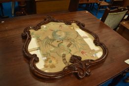 A Victorian mahogany framed embroidery panel depicting exotic bird, approx 74 x 62cm