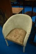 A vintage Lloyd Loom child's tub chair