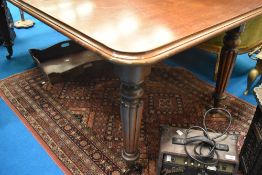 A Victorian style mahogany banquetting table in the Gillows style