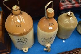 A selection of stoneware flagons, including Kendal & Lancaster interest