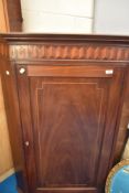 A 19th Century mahogany cupboard having line inlay decoration