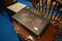 An Oriental laquer work lap desk
