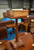A 19th Century and later torchere base and a wooden storage box