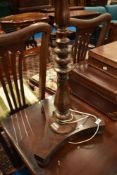 A mahogany floor lamp on William IV base