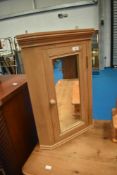 A natural pine corner bathroom cabinet, height approx. 61cm
