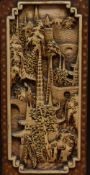20th Century Chinese School, a pair of intricately carved wooden panels depicting figures within