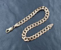 A 9ct rose gold curb link bracelet, 21.5cm, 15.7g