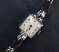A lady's vintage Tudor wrist watch having Arabic numeral dial on a square face in a steel case on