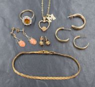 A small selection of gold and yellow metal jewellery, including a 9ct gold snake chain bracelet, a
