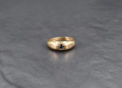 A sapphire and diamond set 9ct gold gypsy ring, size N & approx 3.8g