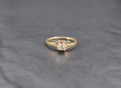 A diamond solitaire ring, the mixed cut diamond measuring approximately 0.33ct, in a six claw