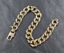 A 9ct gold curb link bracelet, with loops for safety chain, approximately 20.5cm, 20.7g