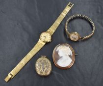 A 9ct gold wrist watch by Everite having baton numeral dial in plain gold case, missing glass and