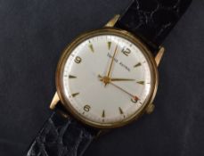 A gent's 9ct gold Smiths Astral manual wrist watch having Arabic quarter numerals and baton dial