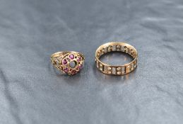Two damaged 9ct gold rings, one having a cluster of rubies but missing the central stone, the