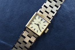 A lady's 1980's 9ct gold wrist watch by Omega movement no; 30515144 having a baton numeral dial to