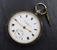 A George V silver open face key wound pocket watch, the white dial with Roman numerals and