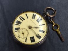 A silver open faced key wound pocket watch, the white dial having thick Roman numerals and