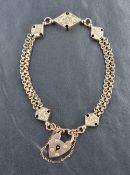 A 9ct gold cable chain bracelet, the two strand bracelet with decorative triangular links and