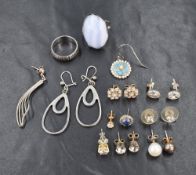 A small selection of white metal earrings of various forms, most stamped 925/800, an oversized white