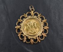 An Elizabeth II 1978 sovereign, mounted in a 9ct gold open work sunburst motif pendant mount, 13.