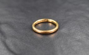 A 22ct gold wedding band, ring size I-J, 3.5g