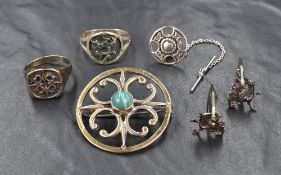 Three pieces of Scottish silver jewellery by Ola Gorie including gents's Maeshowe Dragon cufflinks