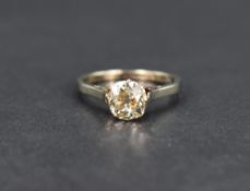 A diamond solitaire ring, the old cut diamond being approx 1.1ct in an 8 claw raised mount with flat