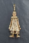 A 9ct gold articulated clown pendant, set with diamonds and sapphires to the body, 18.7g