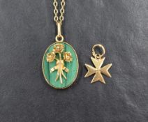 A yellow metal pendant bearing marks (worn) having an oval malachite panel with applique yellow