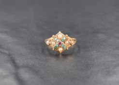 A 15ct ruby, turquoise and seed pearl ring, the central ruby with a turquoise and seed pearl