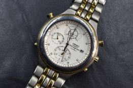 A Seiko quartz chronograph titanium wristwatch, the white dial with dot five minute markers, date