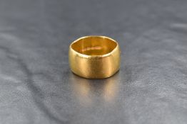 A 22ct gold wedding band of broad form, size T/U & approx 14.4g