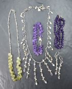 A silver necklace with matching earrings by Dower & Hall having multi semi precious stone set drops,
