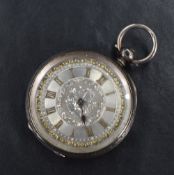 A small silver open face key wound pocket watch, the silver and gold tone dial with Roman