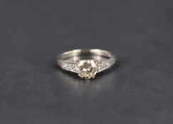 A diamond solitaire ring, the brilliant cut diamond being approx 0.54ct in a 6 claw raised mount