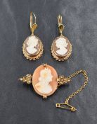 A pair of 9ct shell cameo drop earrings, in bezel settings with twist detail, sold along with a