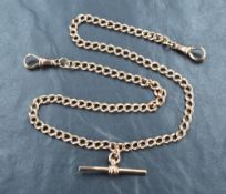 A 9ct rose gold curb chain necklace modelled as a watch chain with T bar, approx 18' & 26.4g