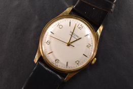 A gent's 9ct gold Record Deluxe manual wrist watch having Arabic numeral and baton dial to