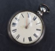 A white metal open face key wound pocket watch, the white dial with Roman numerals, in a silver