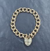 A 9ct gold curb link bracelet with 9ct gold heart padlock, 38.9g