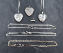 A selection of small silver jewellery comprising three heart lockets, two on chains, three further