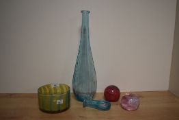 A 20th Century yellow studio art glass bowl with blue striped design, measuring 9cm high, together