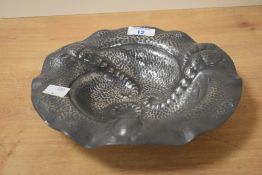An early 20th Century continental planished pewter bowl of Arts & Crafts design, diameter 24cm